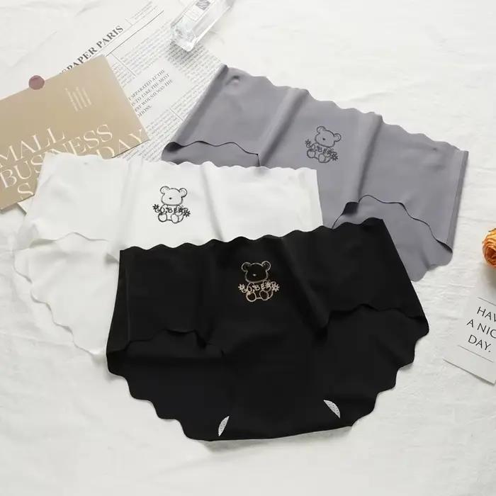 Lingerie Invisible sans couture pour femmes, sous-vêtements de couleur unie, en soie glacée, taille basse, slips respirants pour dames