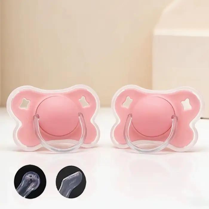 Lot de 2 sucettes pour bébé en forme de papillon avec couvercle pour usage quotidien (tétine ronde cerise) et usage nocturne (tétine pouce)