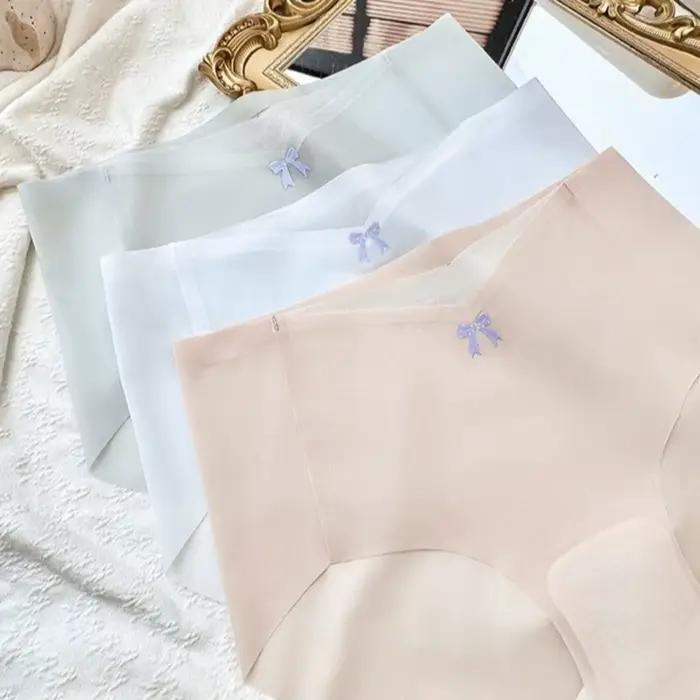Culottes transparentes en soie glacée avec nœud