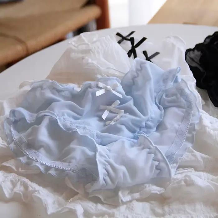 Culotte femme taille moyenne en dentelle respirante perforée avec nœud papillon
