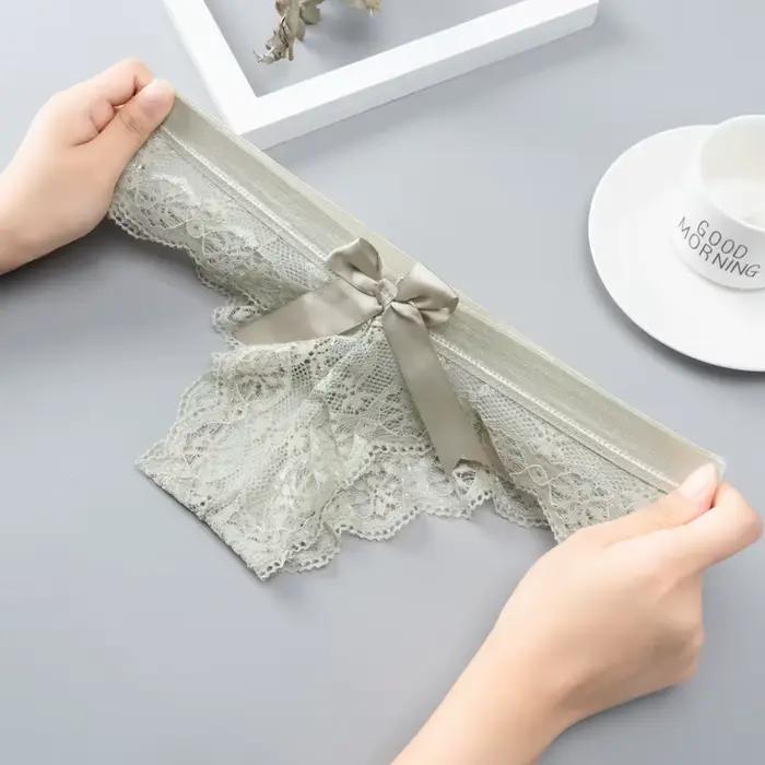Incroyable femmes Lingerie G String sous-vêtements en dentelle femme nœud Sexy t-back