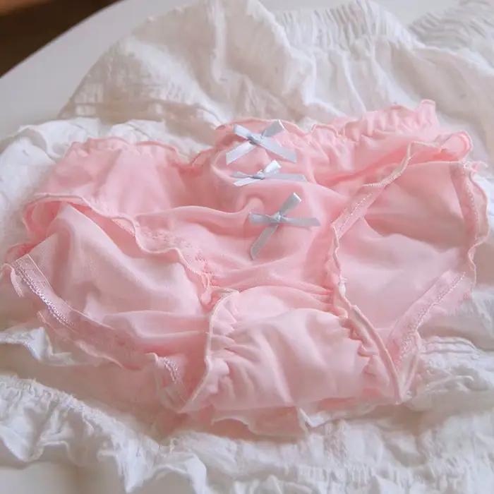 Culotte femme taille moyenne en dentelle respirante perforée avec nœud papillon