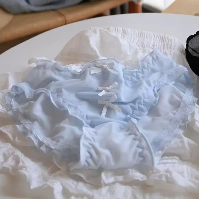 Culotte femme taille moyenne en dentelle respirante perforée avec nœud papillon