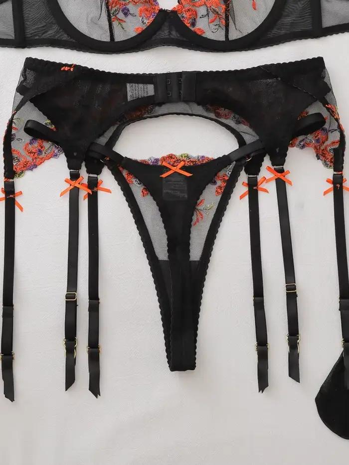 Ensemble de lingerie sculptante transparente à broderie florale de luxe 4 pièces avec bas cuissardes