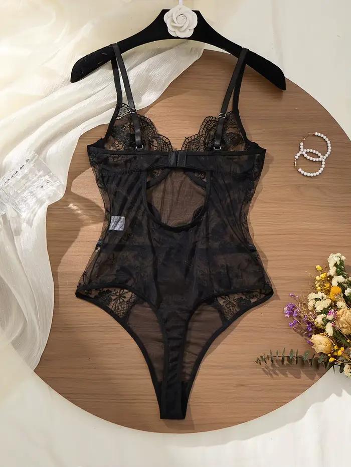 Body en dentelle noire avec broderie florale