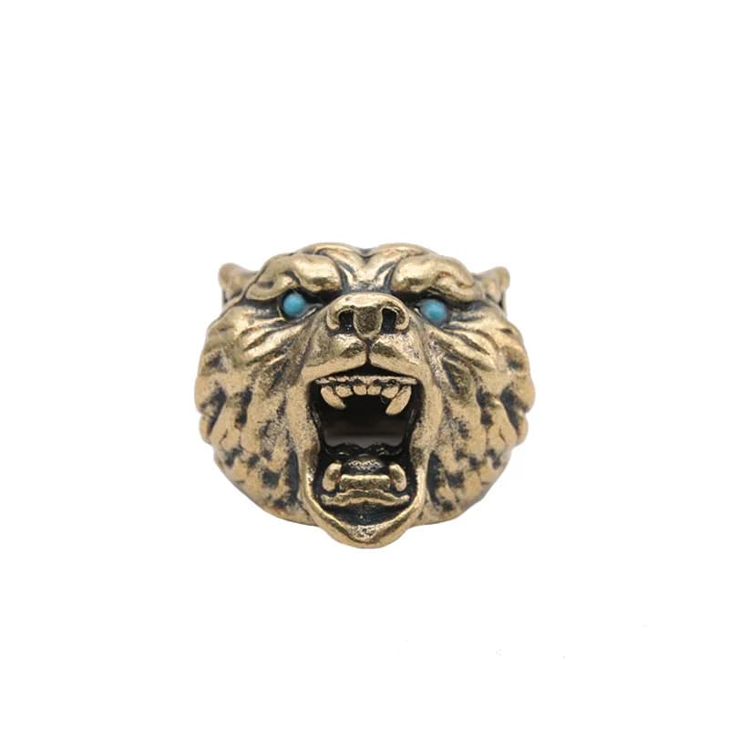 Sculpture de tête d'ours brun rugissant avec yeux bleus noirs, perle de paracorde en laiton, pendent